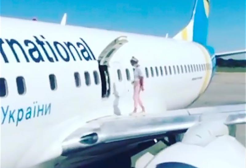 mother-blacklisted-from-flying-for-opening-emergency-exit