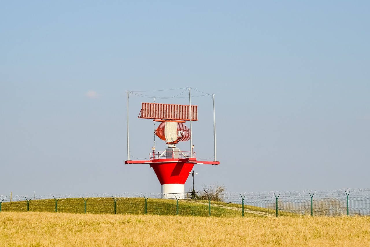 An airport radar tower, showing a standard twin primary and secondary surveillance configuration