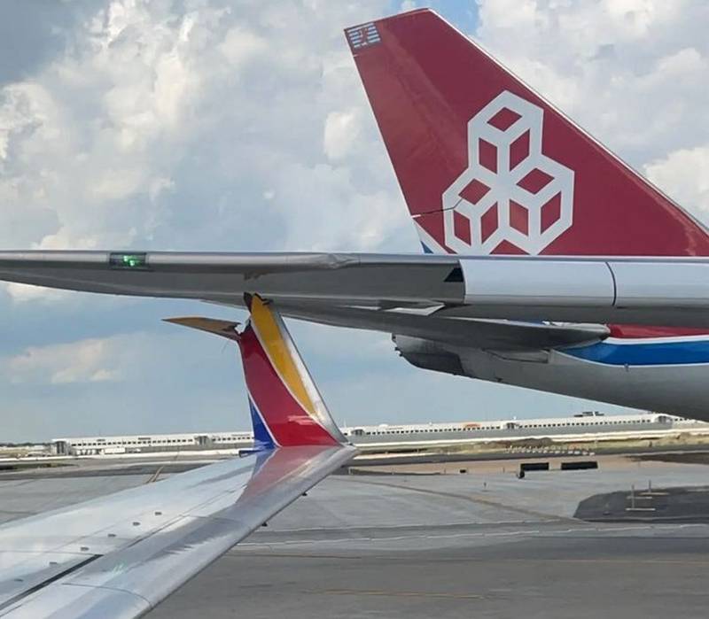 INCIDENT: Southwest and Cargolux Touch Wings!